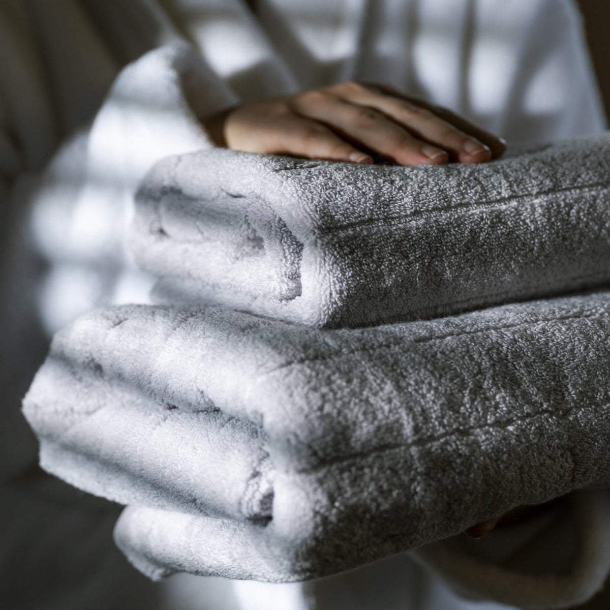Ice grey Nordic Heritage towels styled at home
